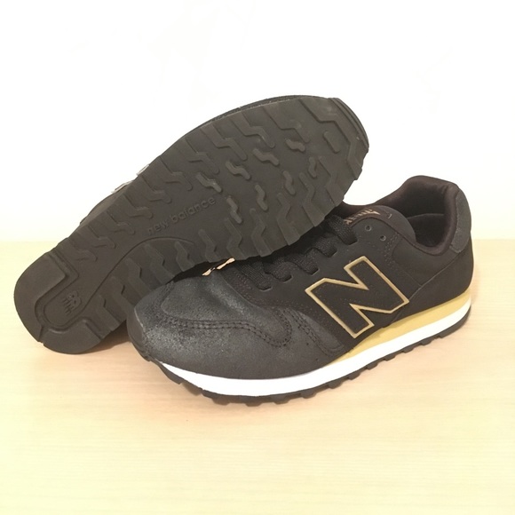 new balance 373 black gold